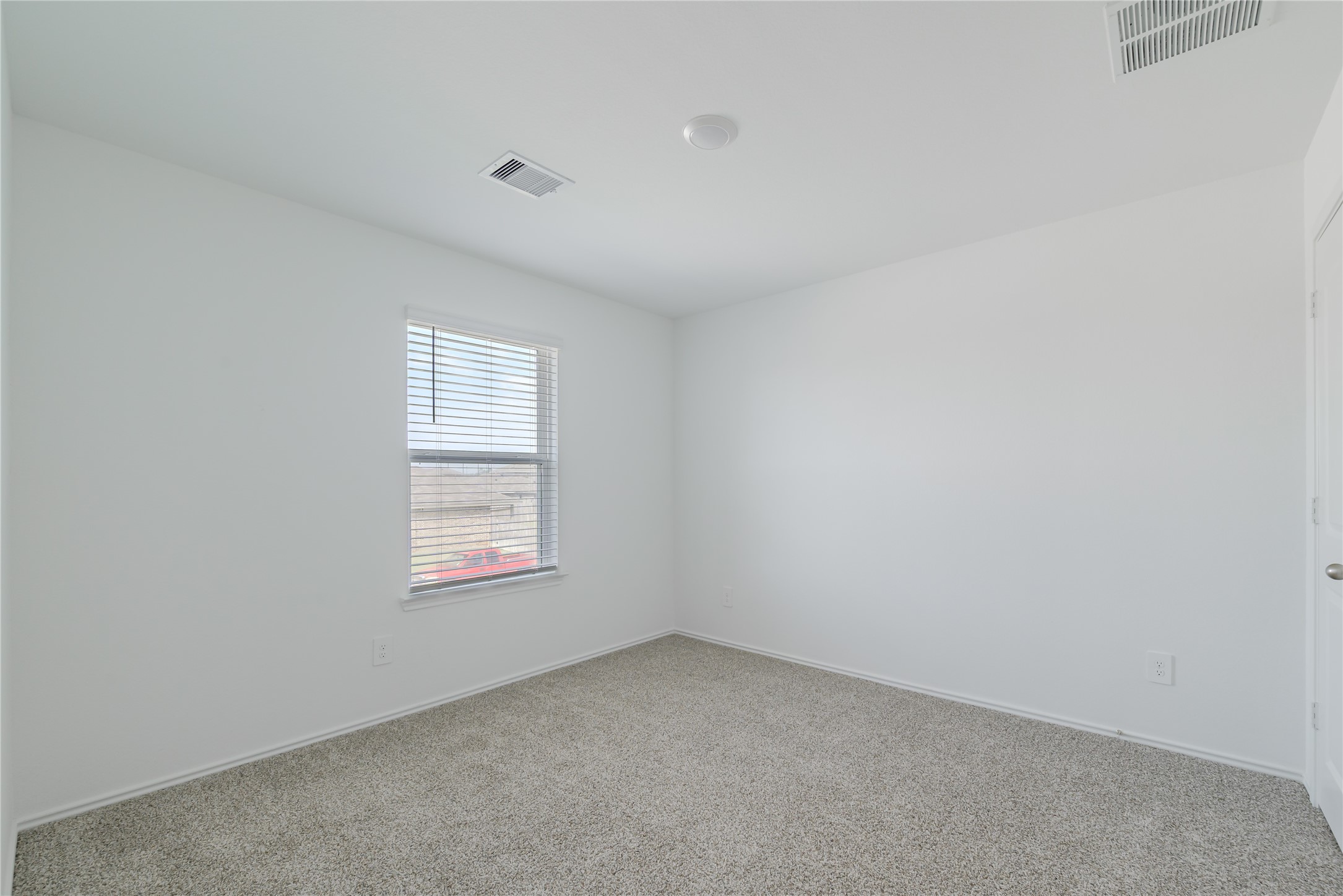 5619 Simcrest Grove Dr Spring Spring, TX 77373 - Photo 28 of 35 an empty room with windows