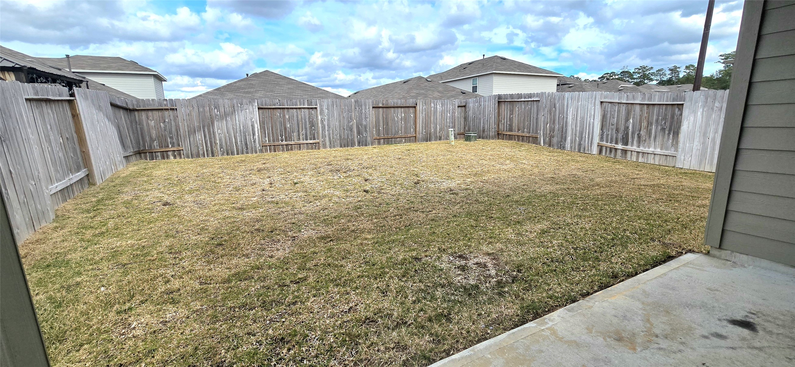 5619 Simcrest Grove Dr Spring Spring, TX 77373 - Photo 35 of 35 a large house with a wooden fence