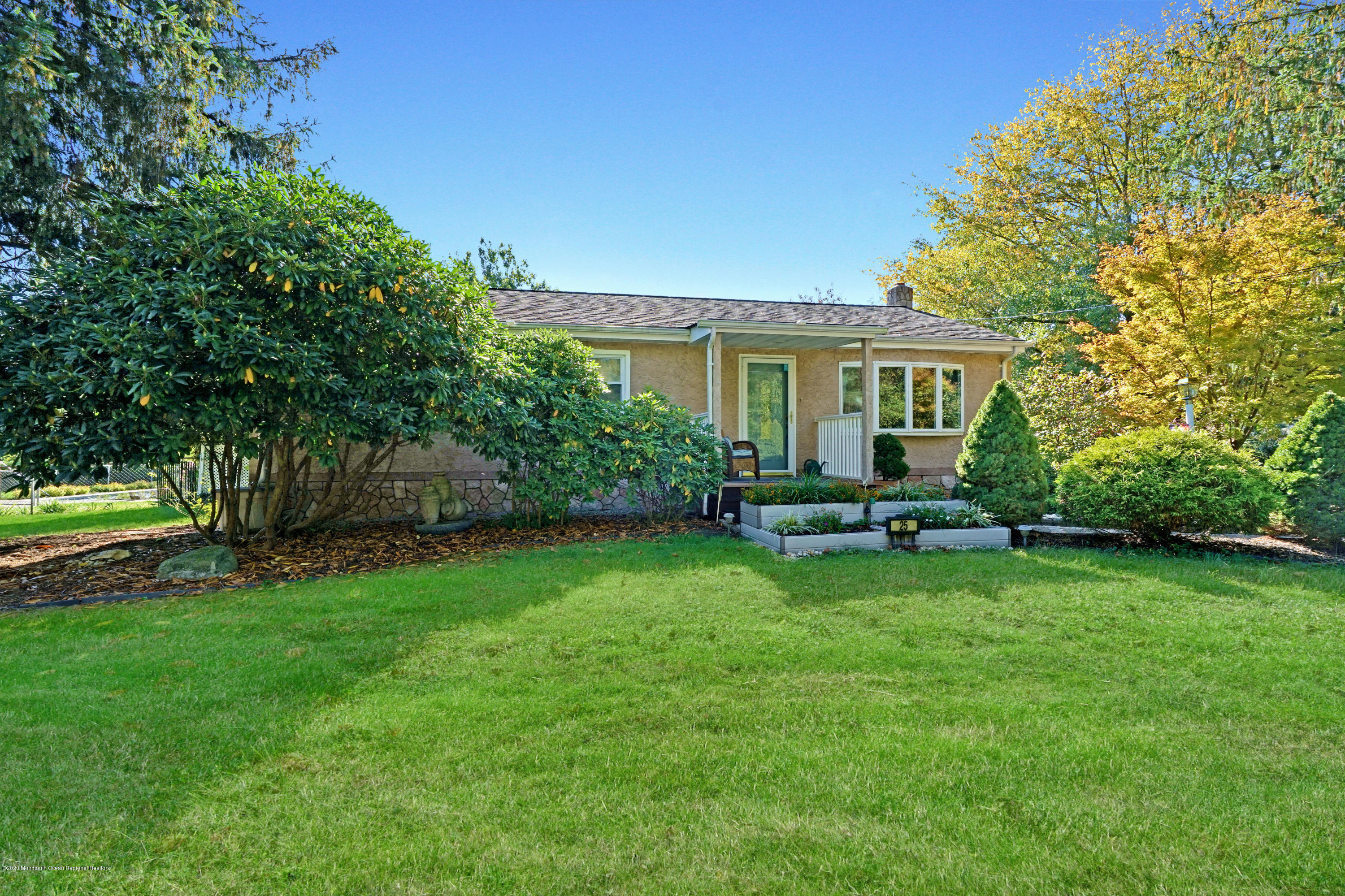 25 Harbor Road Morganville, NJ 07751 - Photo 2 of 39 a view of a house with a backyard