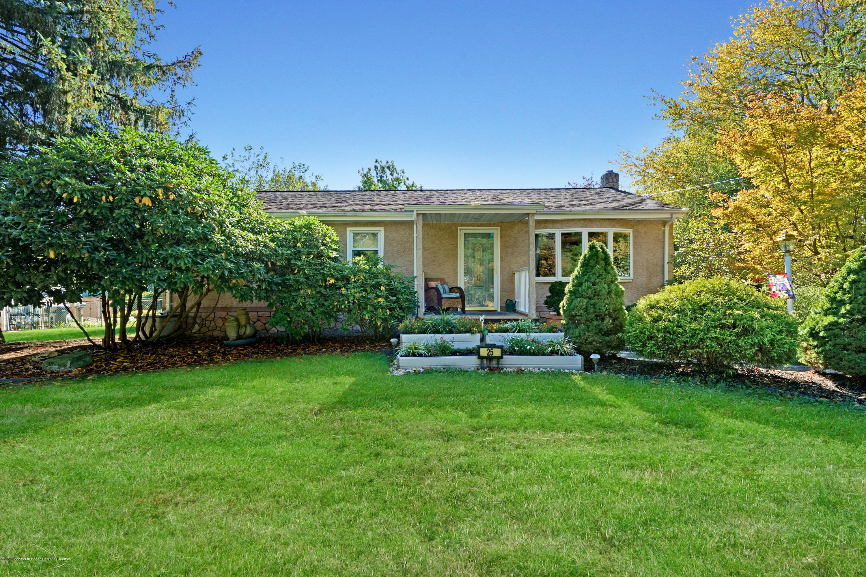 25 Harbor Road Morganville, NJ 07751 - Photo 3 of 39 a view of a house with a backyard