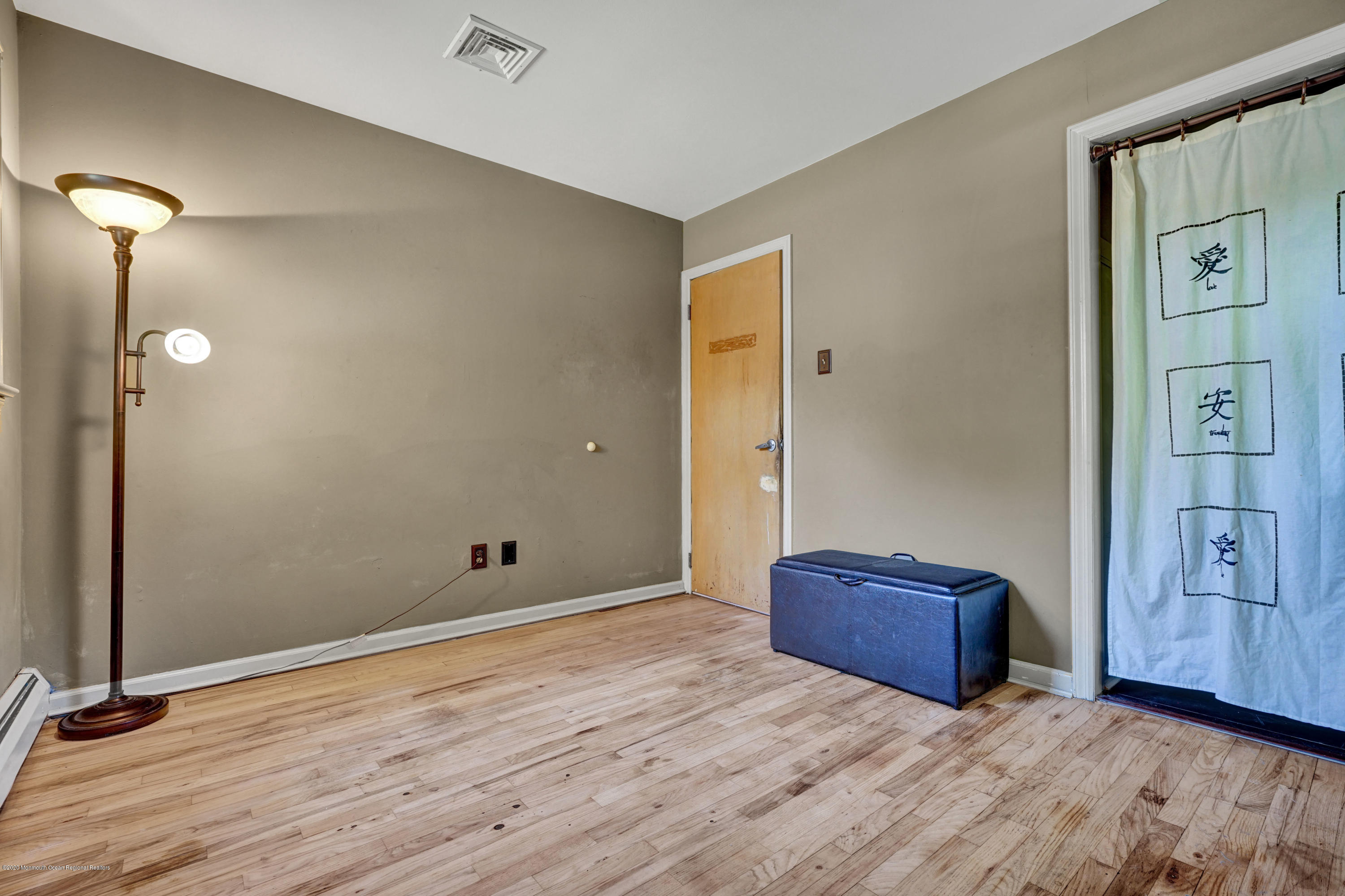 25 Harbor Road Morganville, NJ 07751 - Photo 22 of 39 a view of room with wooden floor and cabinet