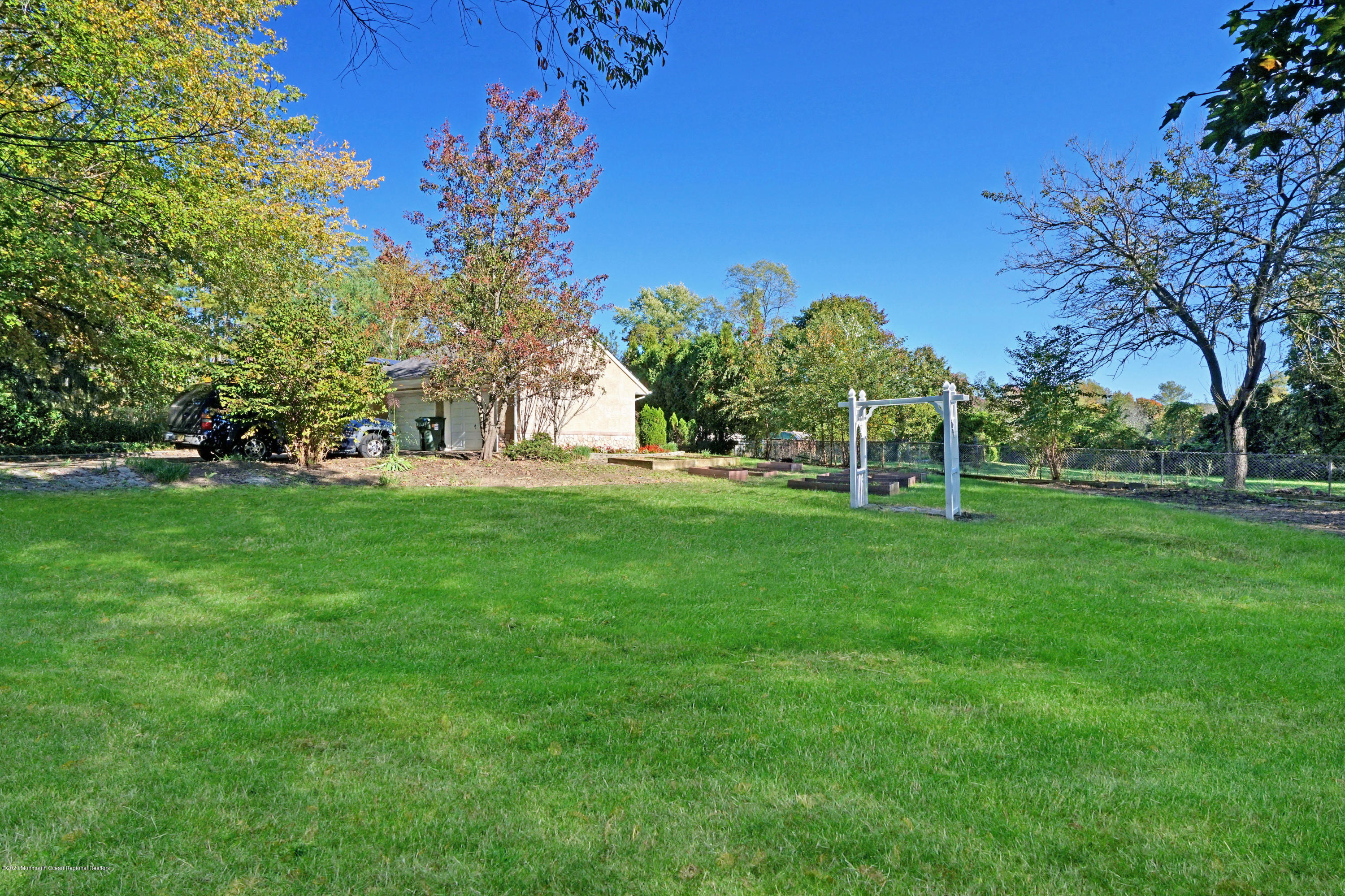 25 Harbor Road Morganville, NJ 07751 - Photo 31 of 39 a view of a park with large trees