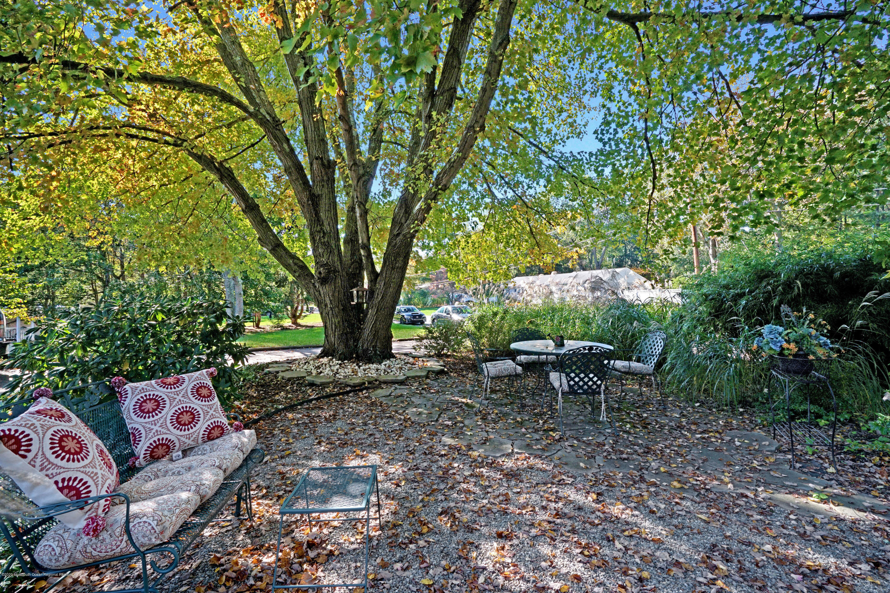 25 Harbor Road Morganville, NJ 07751 - Photo 34 of 39 a view of a backyard with sitting area