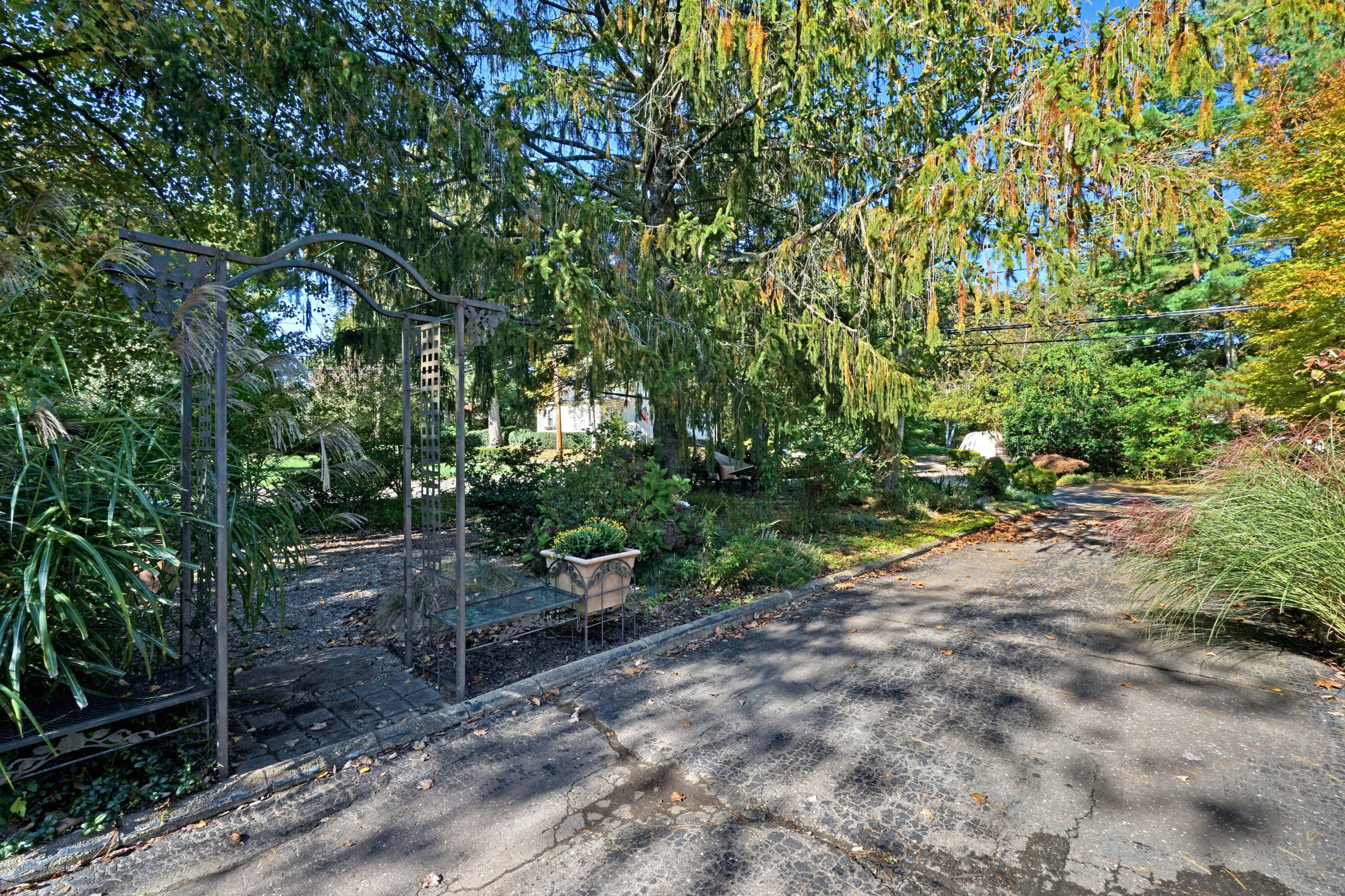 25 Harbor Road Morganville, NJ 07751 - Photo 36 of 39 a view of an outdoor space and garden