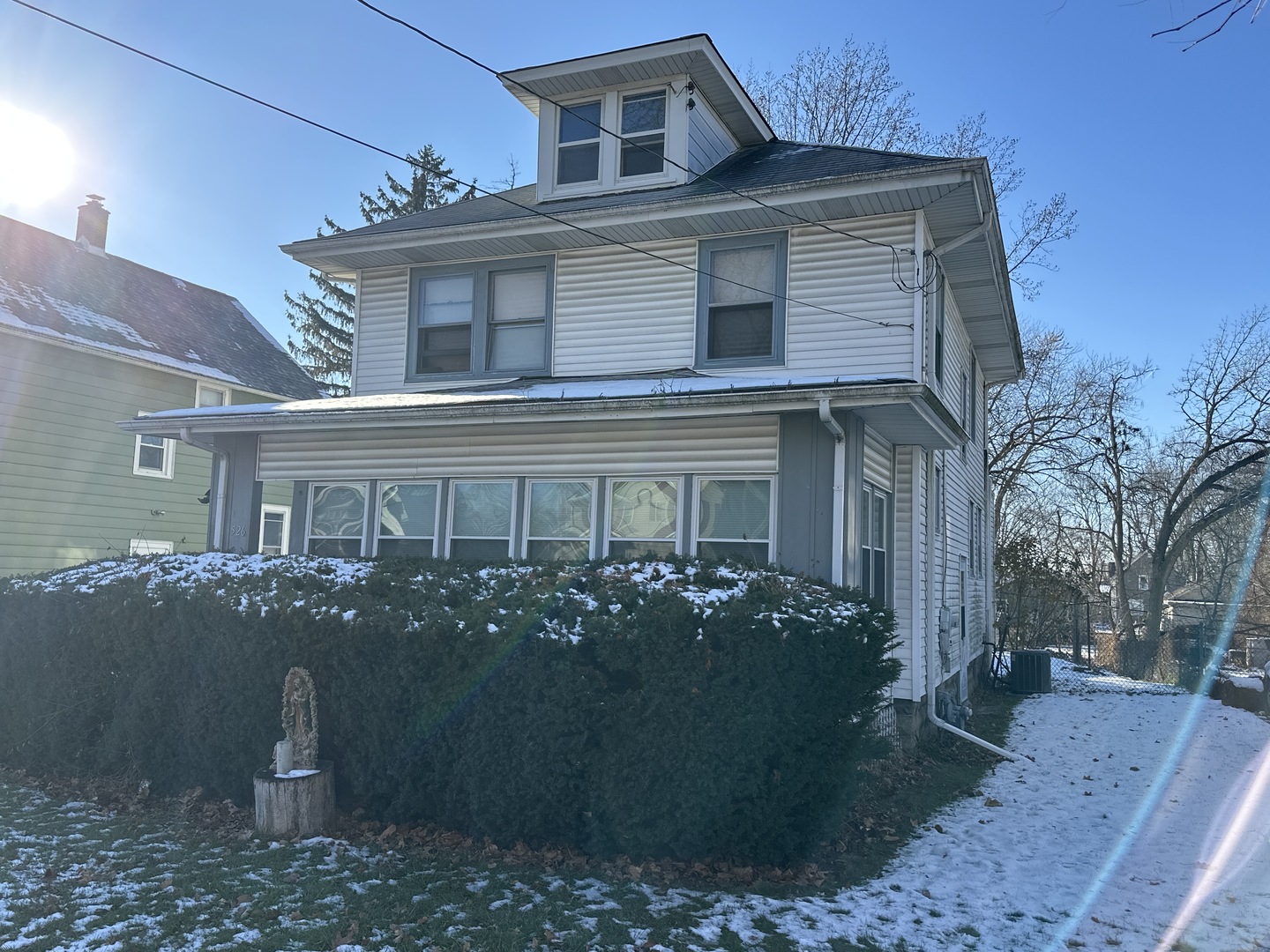526 North View Street Aurora, IL 60506 - Photo 1 of 5 front view of house with a yard