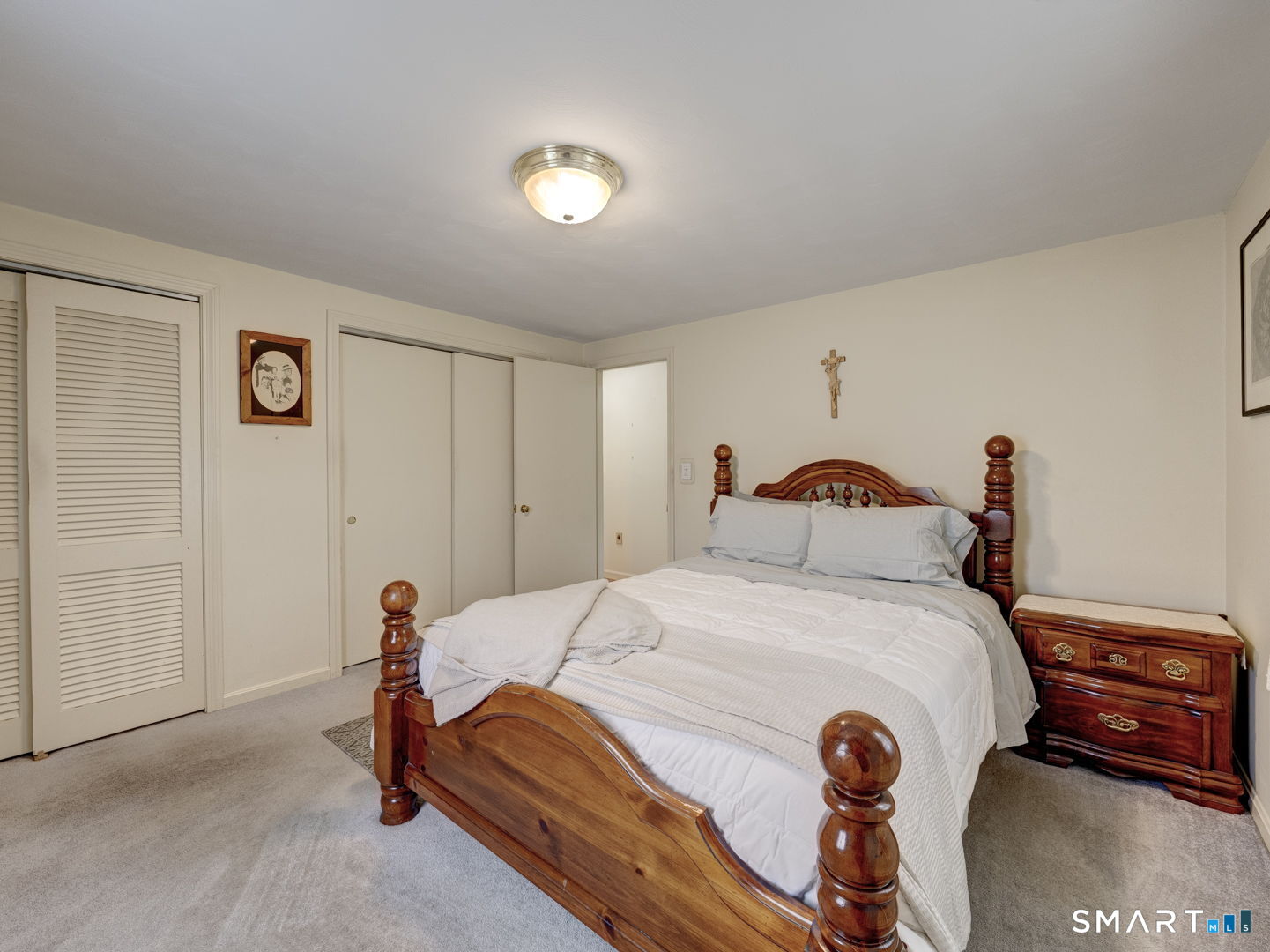 53 Goodwin Drive Somers, CT 06071 - Photo 12 of 22 a bedroom with a bed and a closet