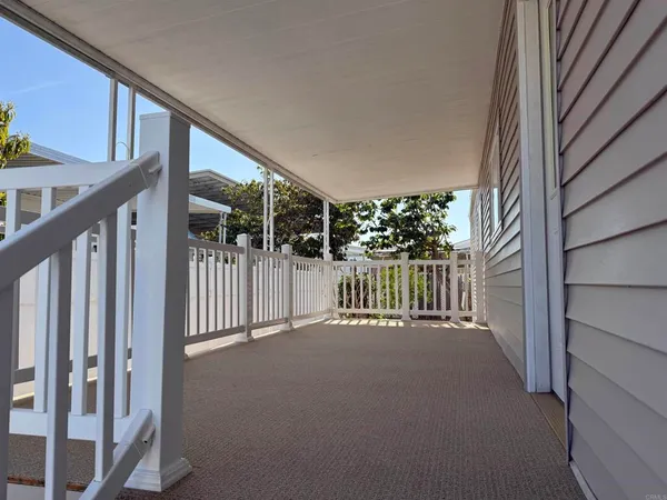 a view of a house with a porch