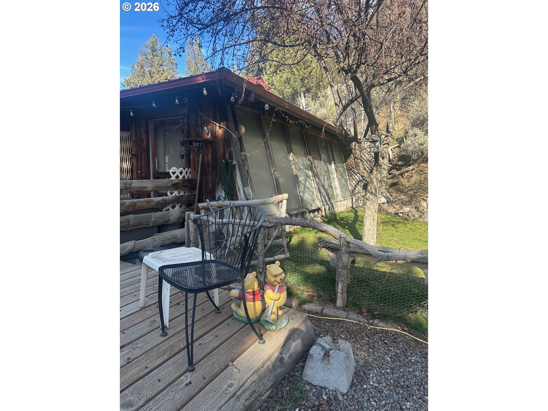 6792 Southeast Juniper Canyon Road Prineville, OR 97754 - Photo 12 of 44 a house view with a outdoor seating space