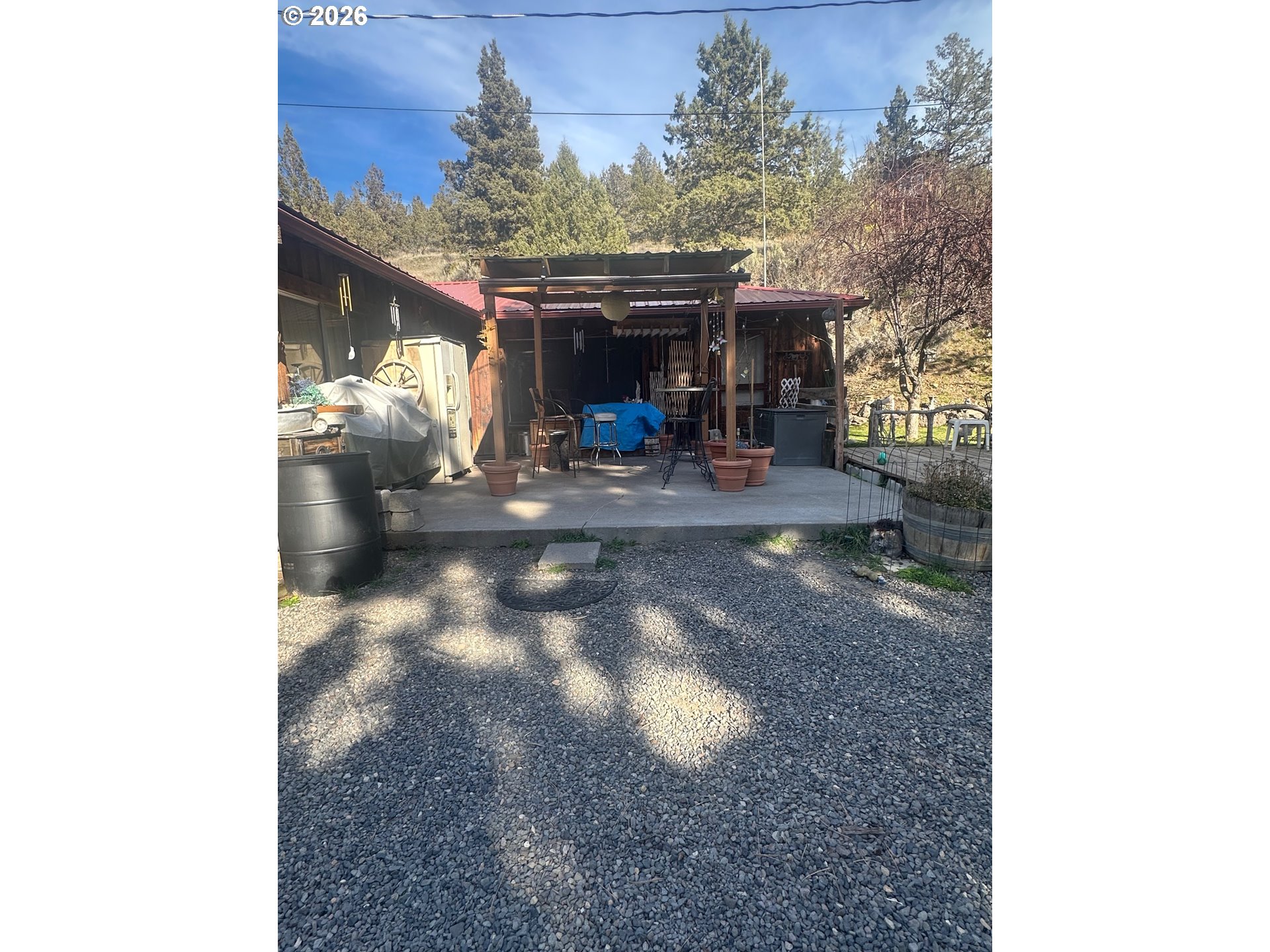 6792 Southeast Juniper Canyon Road Prineville, OR 97754 - Photo 15 of 44 a view of a living room with a porch