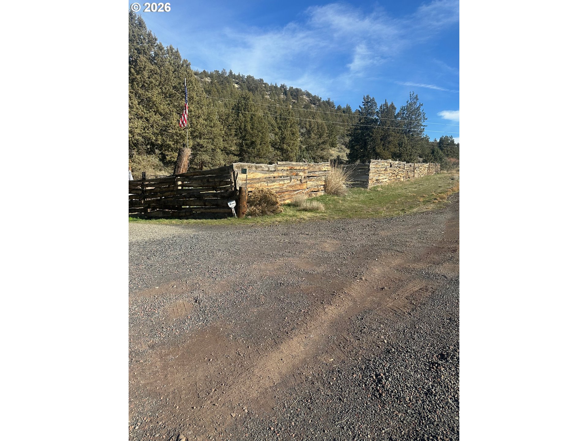 6792 Southeast Juniper Canyon Road Prineville, OR 97754 - Photo 28 of 44 a view of a back yard of the house