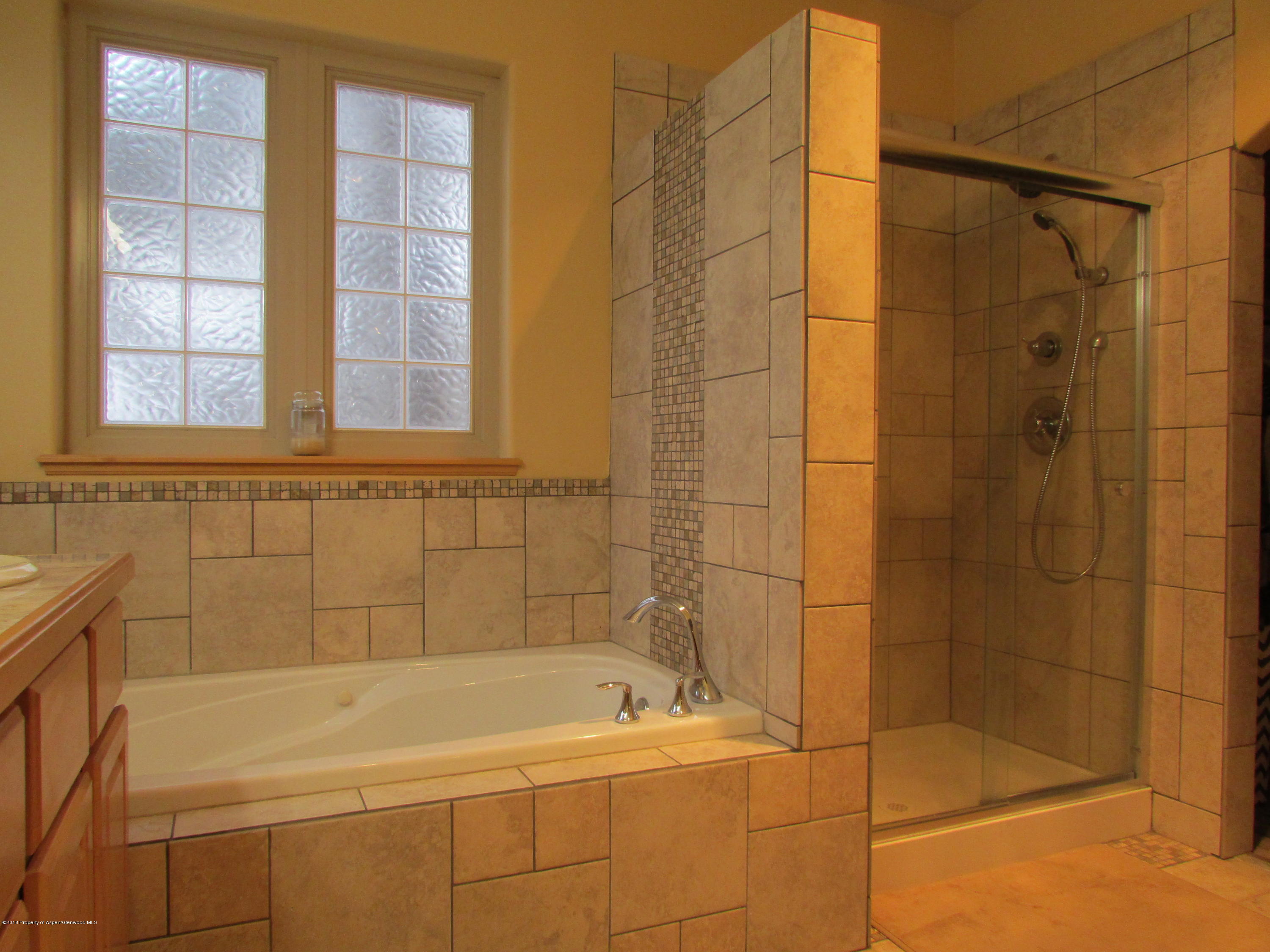 125 Ridge View Place Parachute, CO 81635 - Photo 15 of 26 Master Tub and Shower