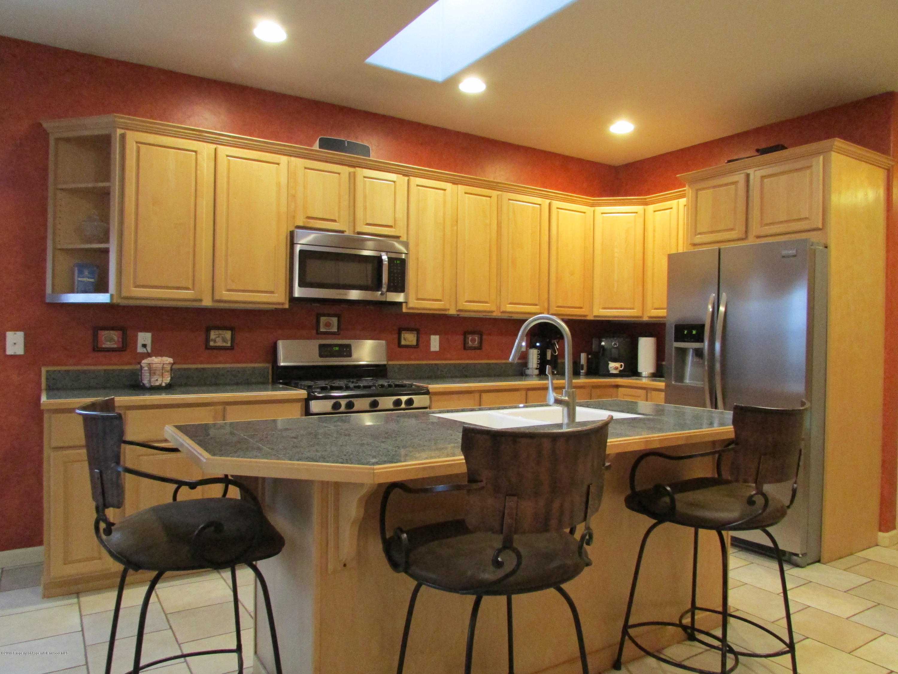 125 Ridge View Place Parachute, CO 81635 - Photo 7 of 26 Kitchen Breakfast Bar