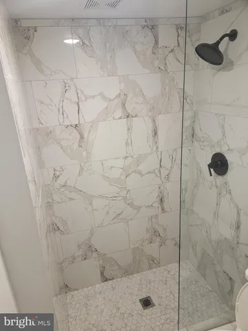 a view of livingroom with window and hardwood floor