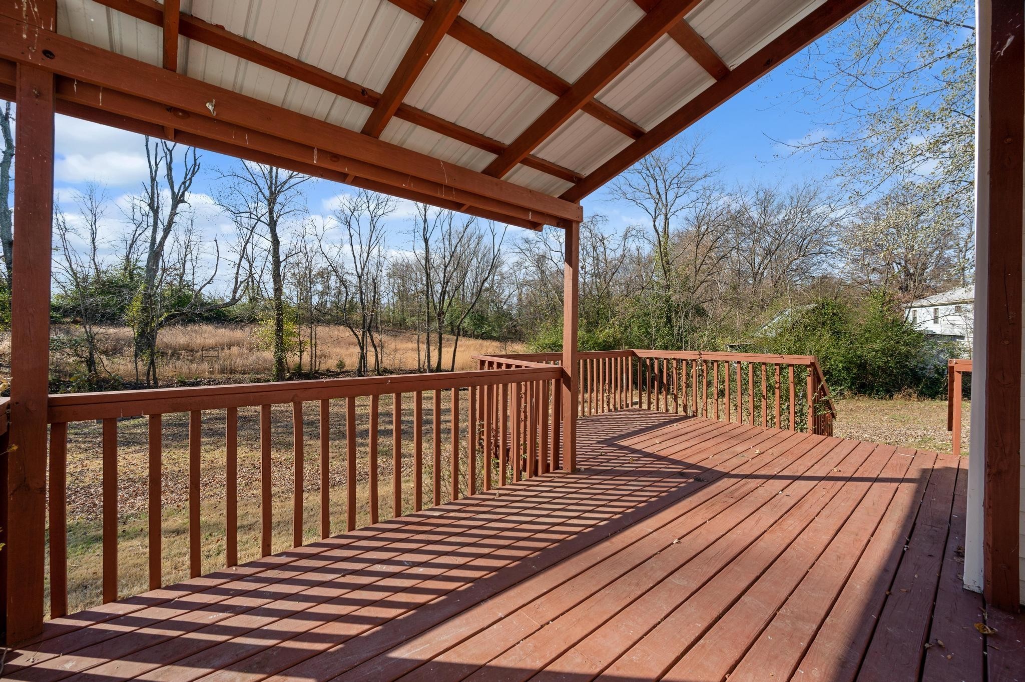 621 Halltown Road Portland, TN 37148 - Photo 19 of 23 a balcony with wooden floor in outdoor space