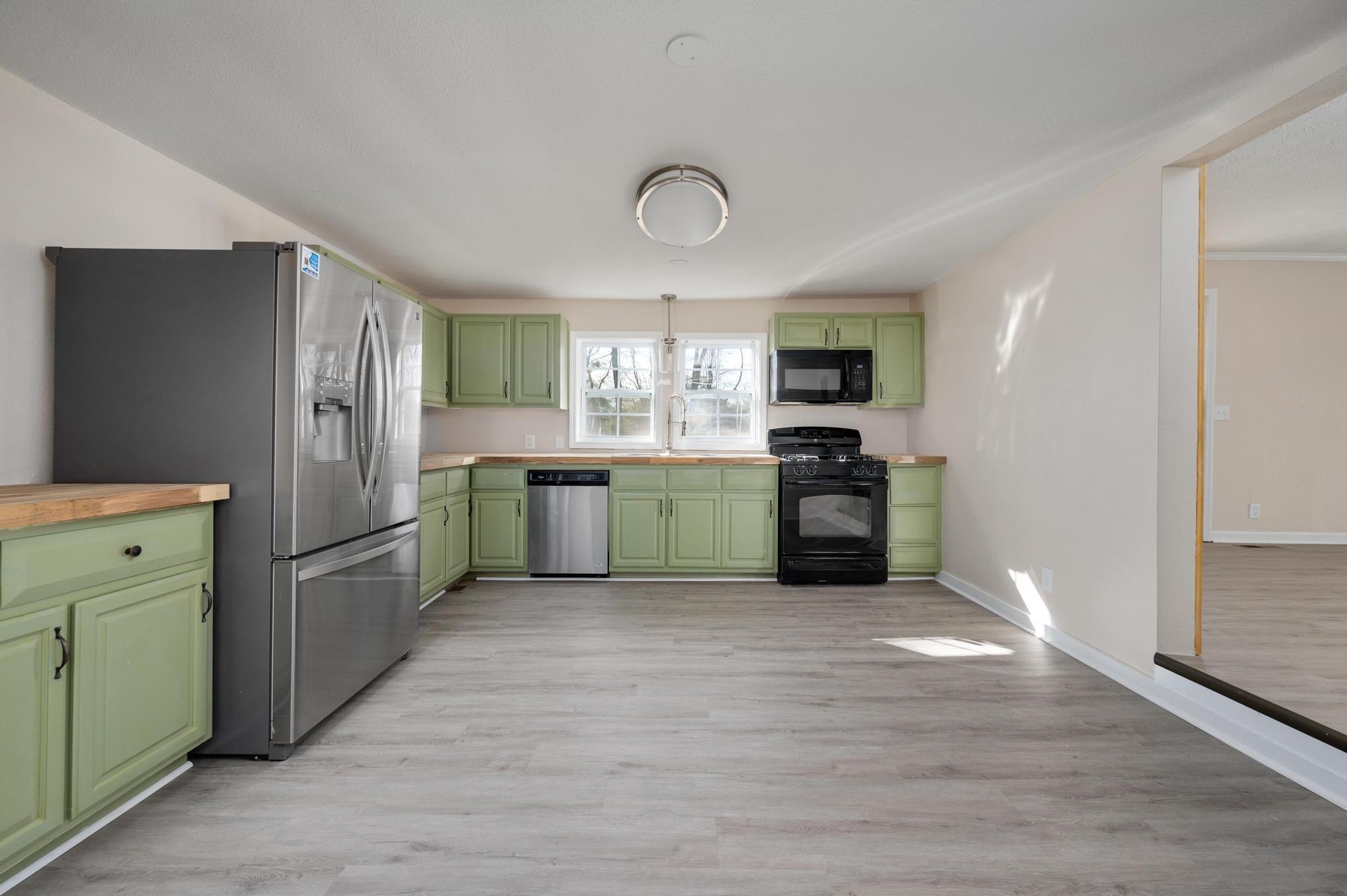 621 Halltown Road Portland, TN 37148 - Photo 5 of 23 a kitchen with a refrigerator and a sink