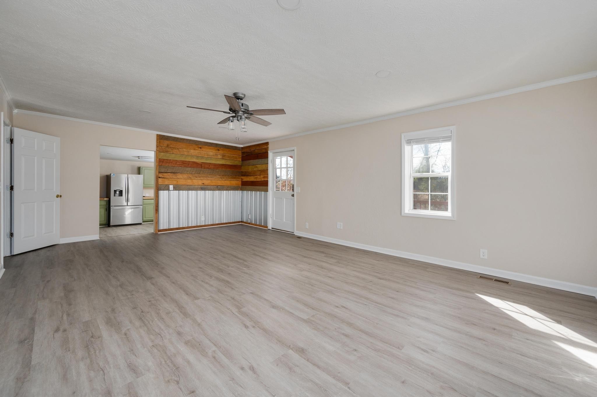 621 Halltown Road Portland, TN 37148 - Photo 10 of 23 wooden floor in an empty room with a window