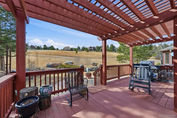 a view of a chairs and tables in the patio