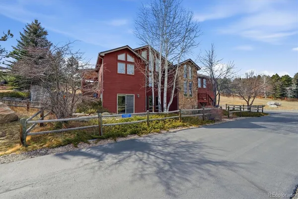 a view of a town with mountains in the background