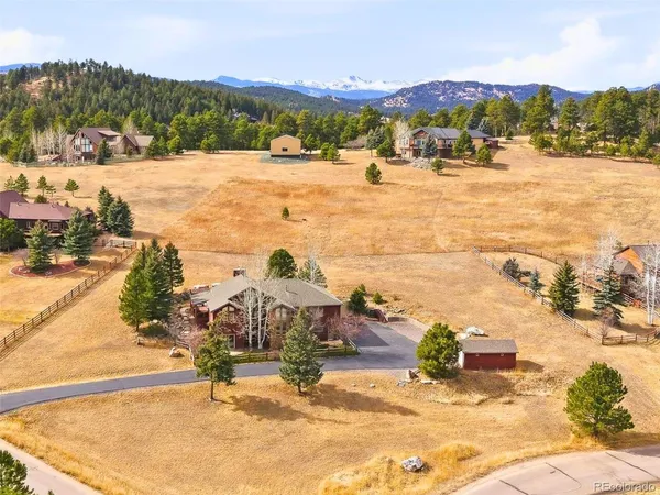 a bathroom with a black and white checkered floor