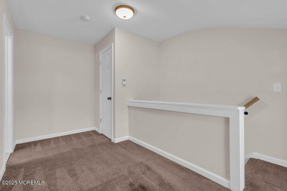 609 Higgins Avenue, Unit 3 Brielle, NJ 08730 - Photo 19 of 25 a view of an empty room