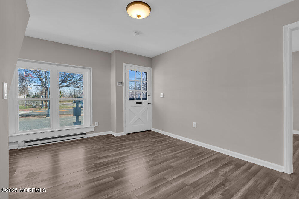 609 Higgins Avenue, Unit 3 Brielle, NJ 08730 - Photo 6 of 25 a view of livingroom with hardwood floor and window