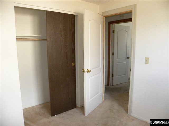 14030 Perlite Drive Reno, NV 89521 - Photo 6 of 8 a view of a kitchen from a hallway