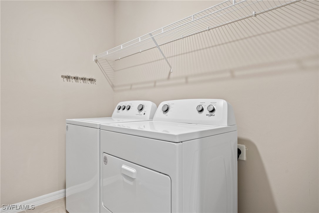 16039 Quinta Drive Punta Gorda, FL 33955 - Photo 32 of 48 a utility room with dryer and washer