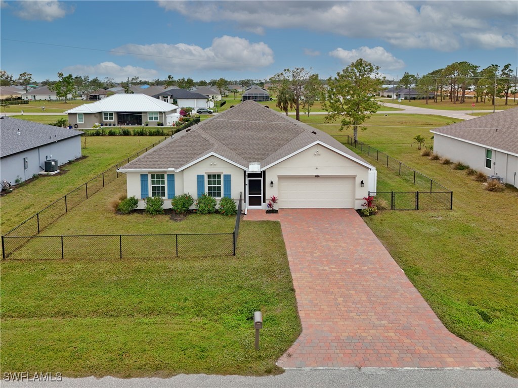 16039 Quinta Drive Punta Gorda, FL 33955 - Photo 33 of 48 a view of house with garden