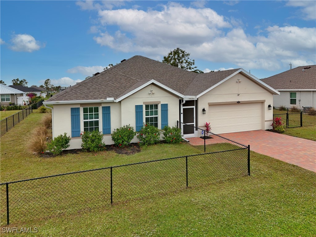 16039 Quinta Drive Punta Gorda, FL 33955 - Photo 35 of 48 a house view with a garden space