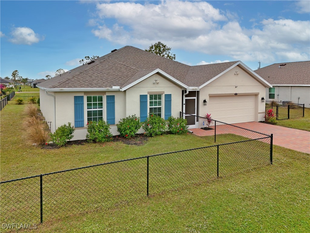 16039 Quinta Drive Punta Gorda, FL 33955 - Photo 46 of 48 a house view with a garden space