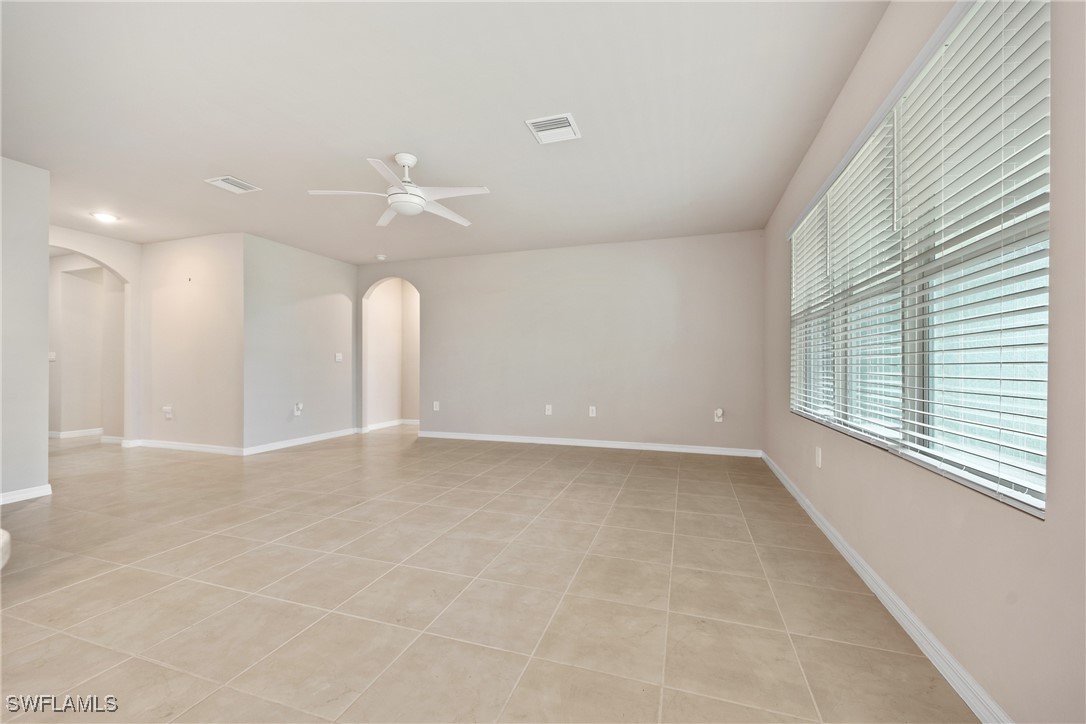 16039 Quinta Drive Punta Gorda, FL 33955 - Photo 9 of 48 a view of a livingroom with a ceiling fan and window