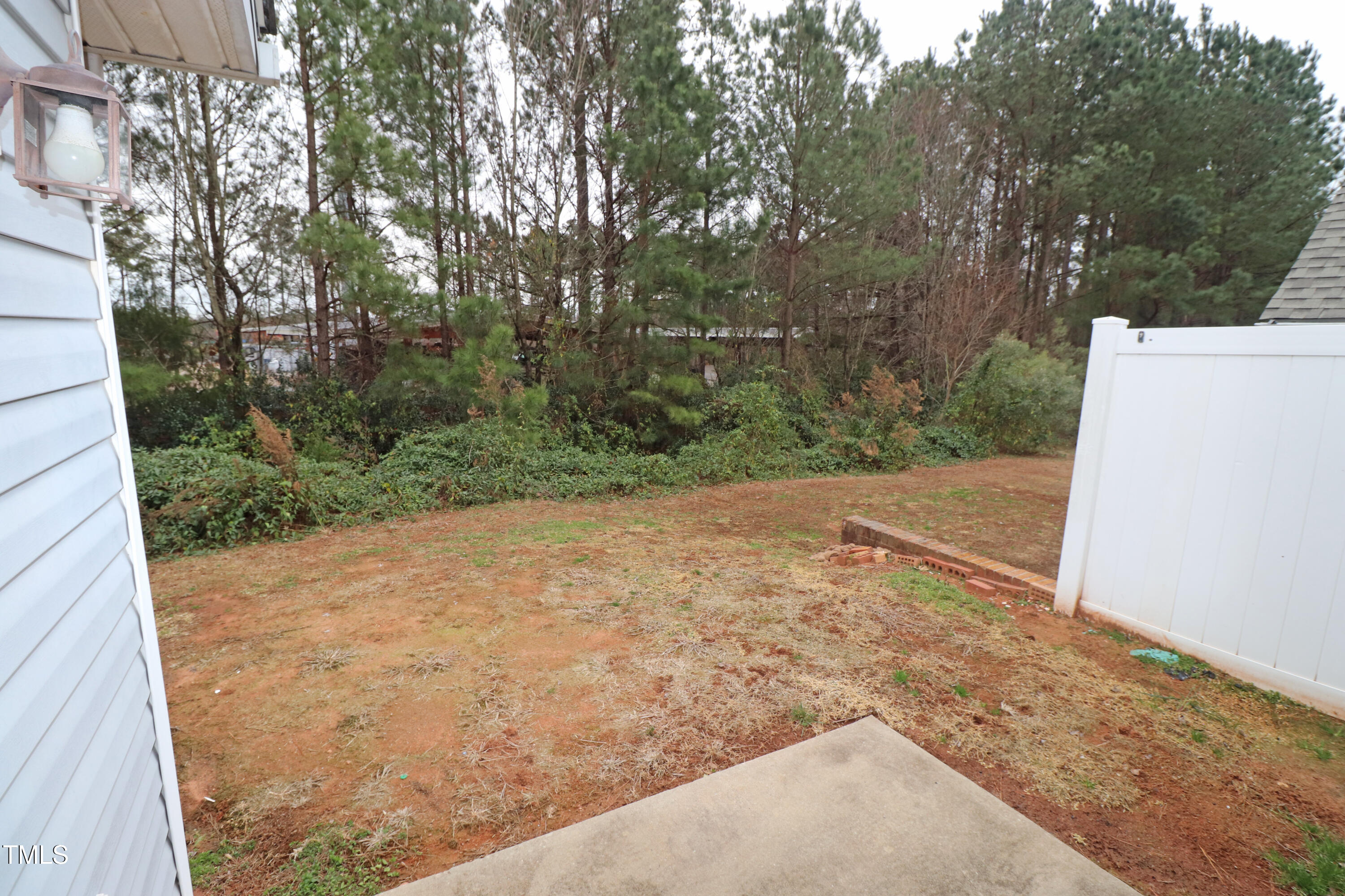 2530 Friedland Place, Unit 104 Raleigh, NC 27617 - Photo 30 of 38 Patio looks at trees