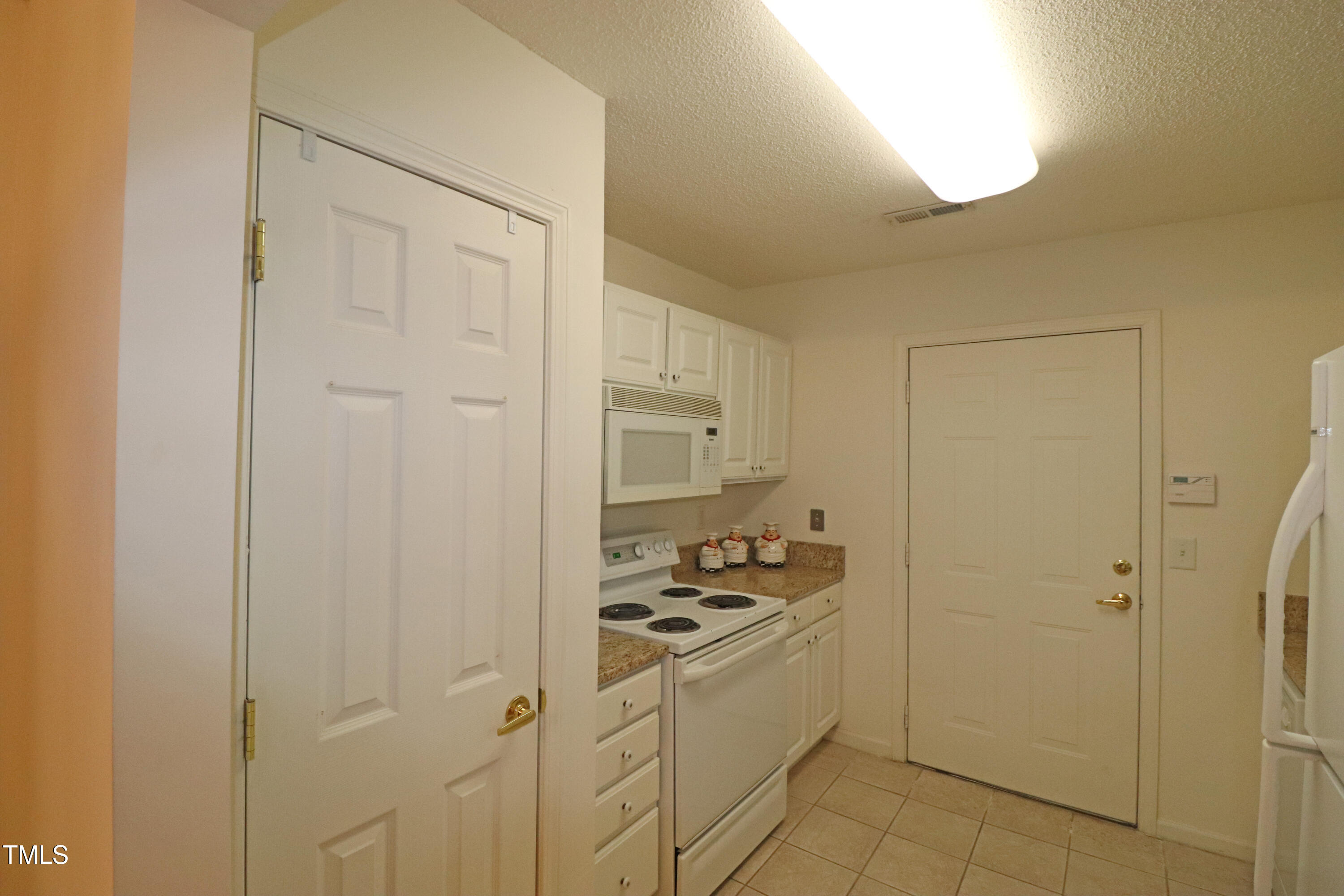 2530 Friedland Place, Unit 104 Raleigh, NC 27617 - Photo 5 of 38 Pantry