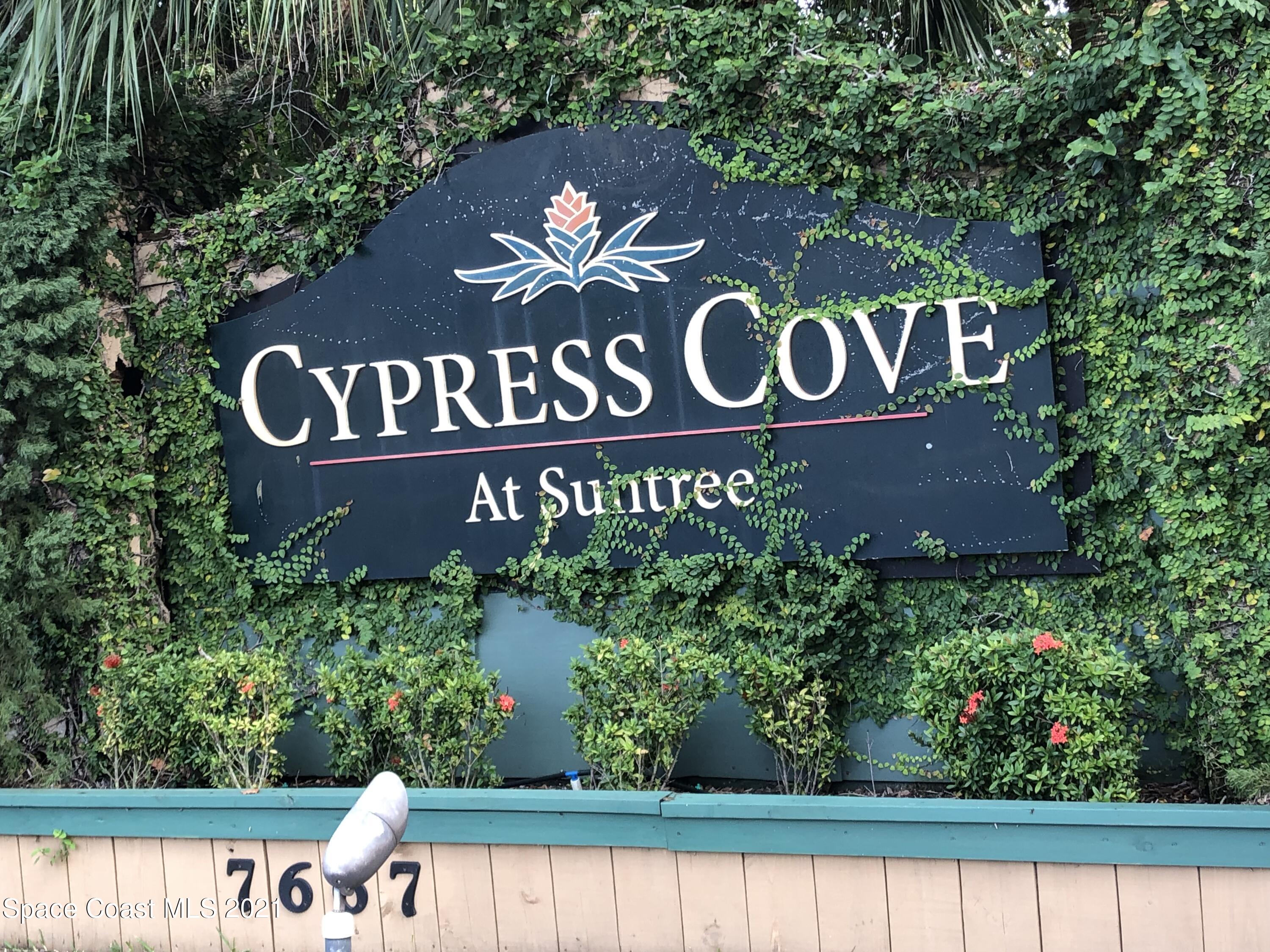 7667 North Wickham Road, Unit 1309 Melbourne, FL 32940 - Photo 2 of 18 a view of sign board with a small yard