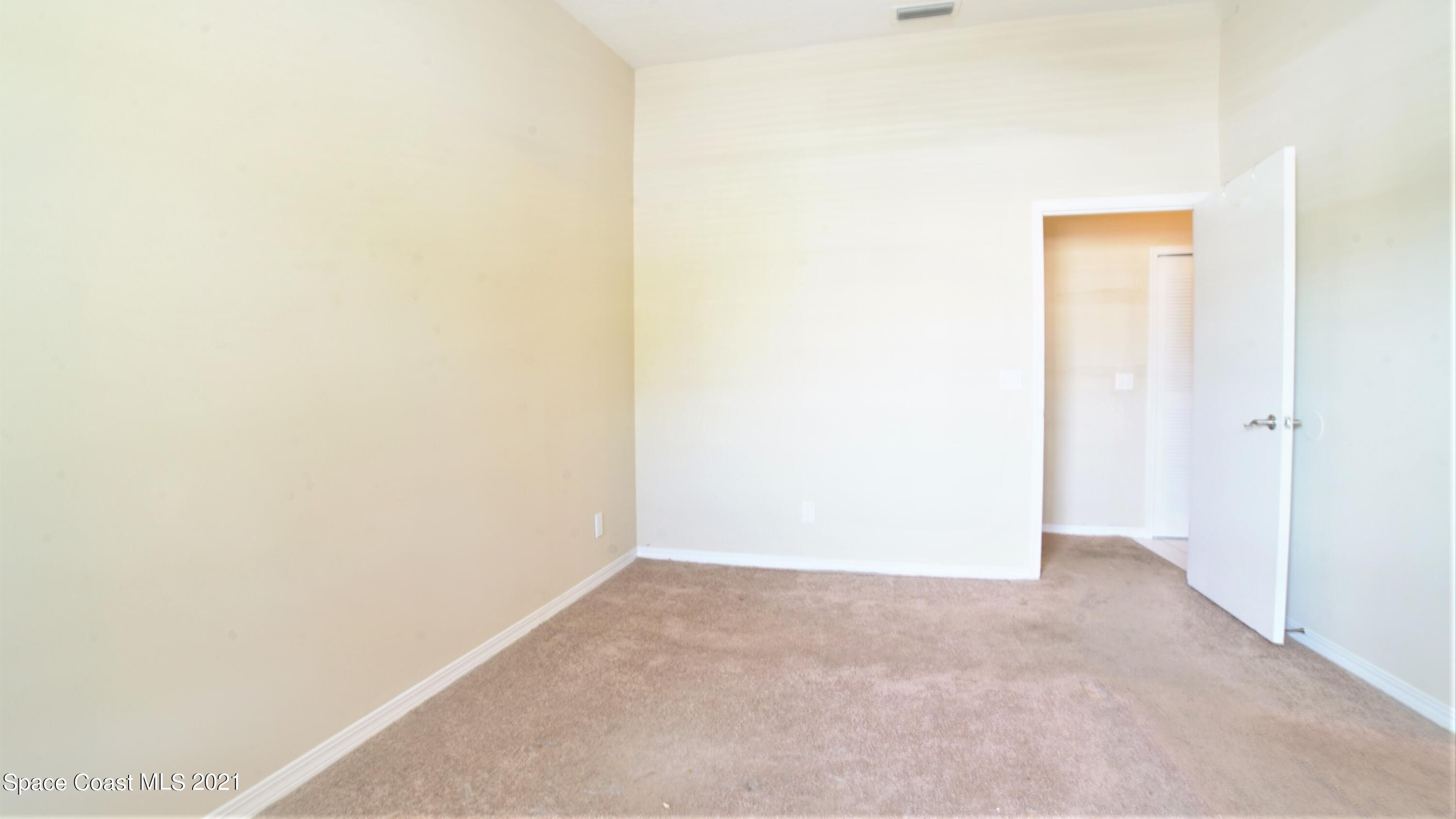 7667 North Wickham Road, Unit 1309 Melbourne, FL 32940 - Photo 11 of 18 a view of an empty room