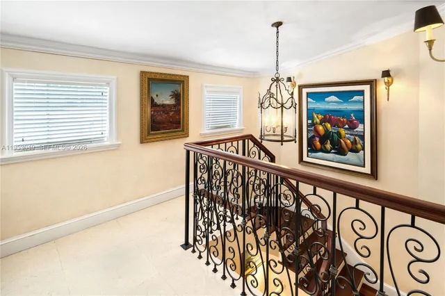 a view of a patio with table and chairs potted plants