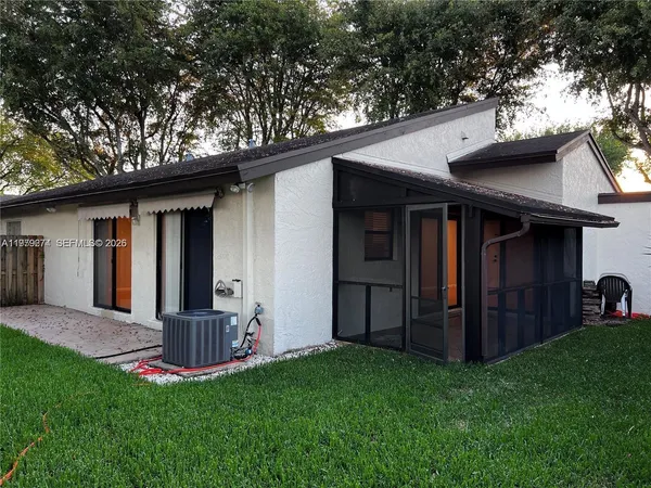a view of a backyard with a garden