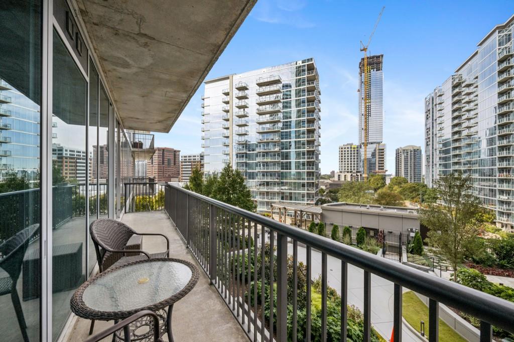 1080 Peachtree Street Northeast, Unit 1012 Atlanta, GA 30309 - Photo 27 of 46 a view of balcony with chairs