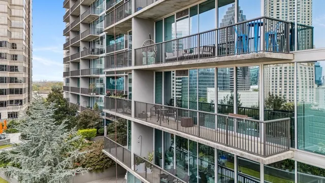 a view of a city with tall buildings