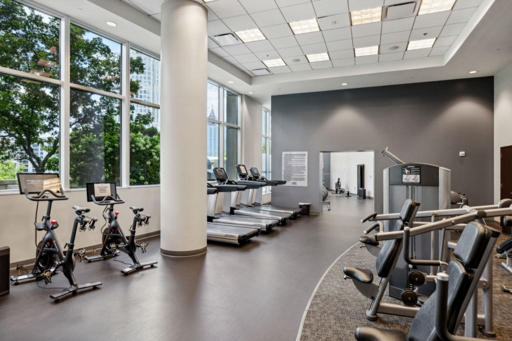 1080 Peachtree Street Northeast, Unit 1012 Atlanta, GA 30309 - Photo 33 of 46 a view of a room with gym equipment