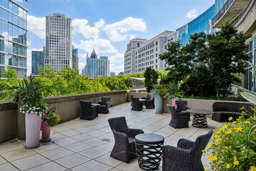 1080 Peachtree Street Northeast, Unit 1012 Atlanta, GA 30309 - Photo 36 of 46 a building view with sitting space and garden space