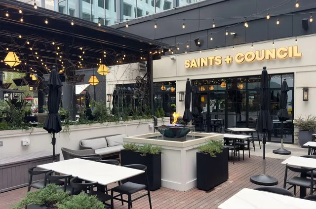 a view of a building with sitting area