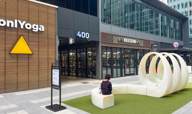 a view of a building with sitting area