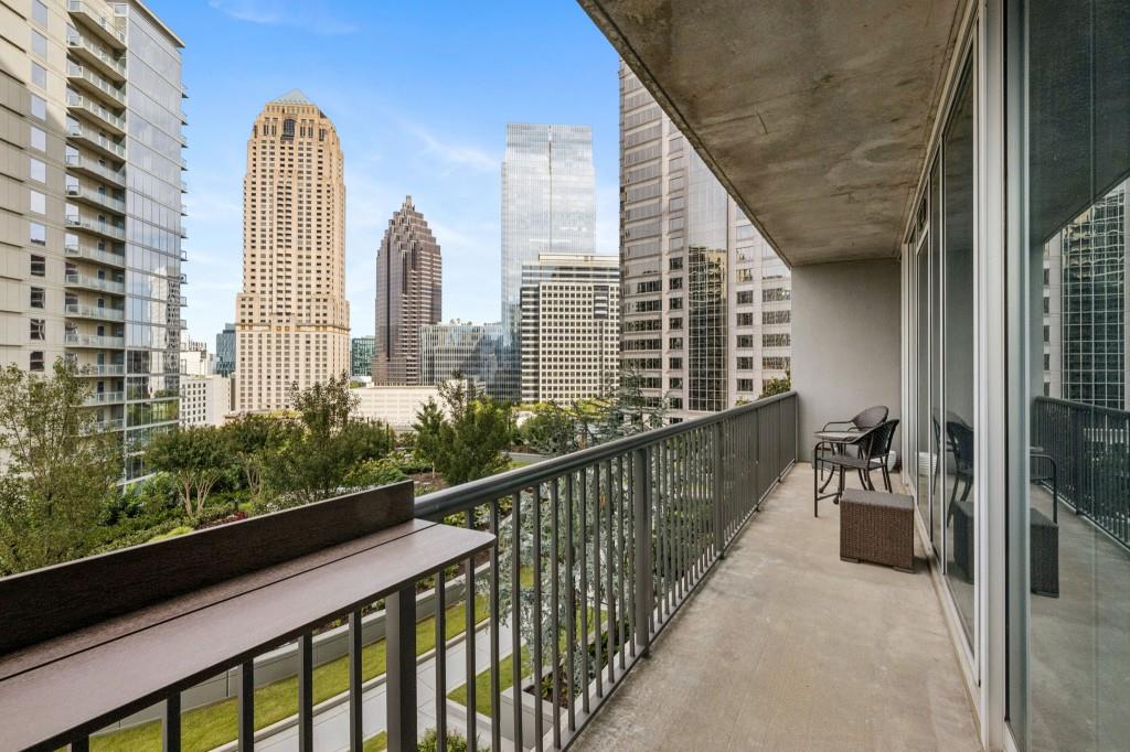 1080 Peachtree Street Northeast, Unit 1012 Atlanta, GA 30309 - Photo 5 of 46 a view of a balcony with two chairs