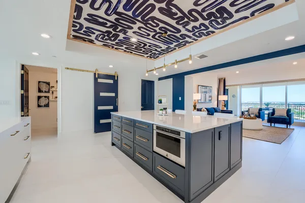 a spacious bathroom with a double vanity sink and a mirror