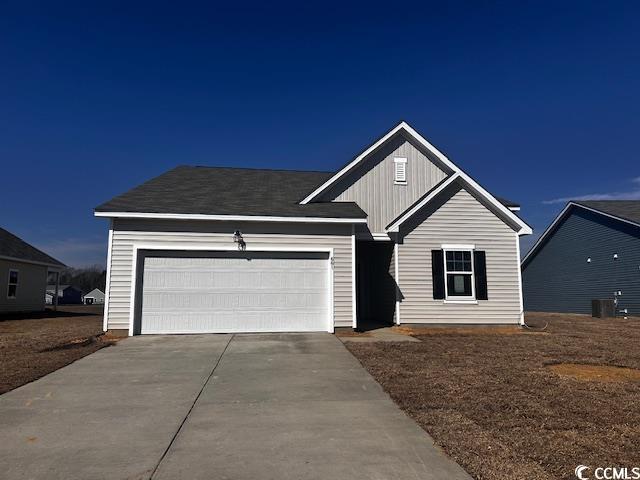661 Castillo Drive Loris, SC 29569 - Photo 1 of 9 Ranch-style home featuring driveway and an attache