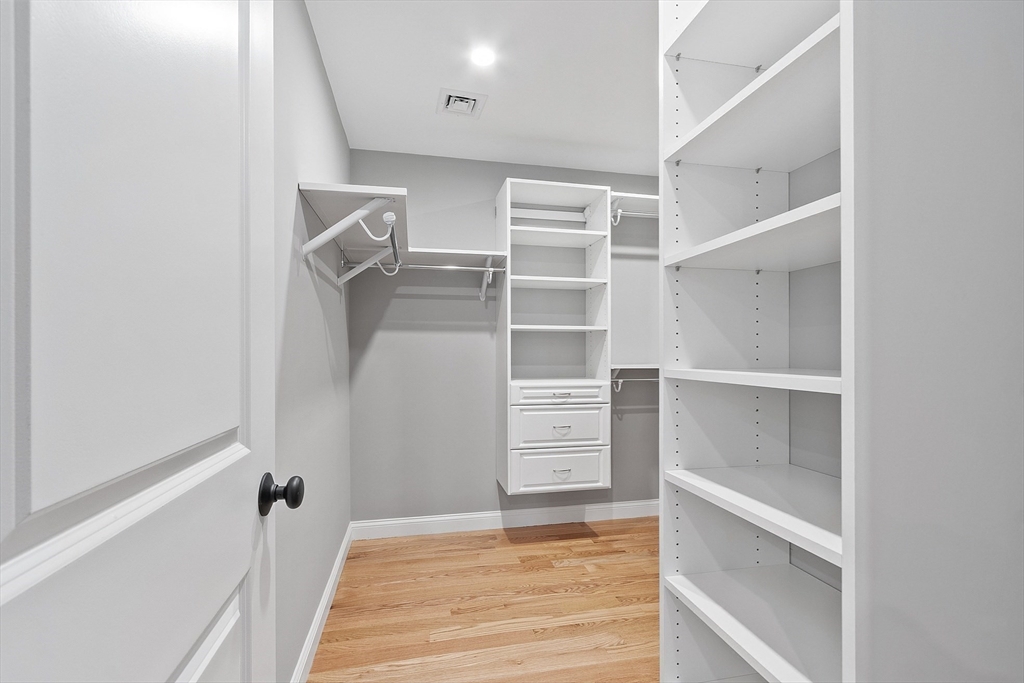15-2 Park Street, Unit B North Reading, MA 01864 - Photo 15 of 39 a view of walk in closet with empty racks