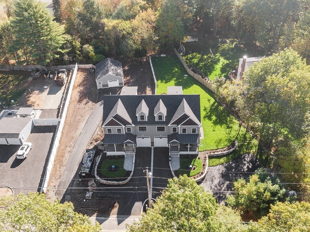 15-2 Park Street, Unit B North Reading, MA 01864 - Photo 29 of 39 an aerial view of a house with swimming pool and outdoor seating
