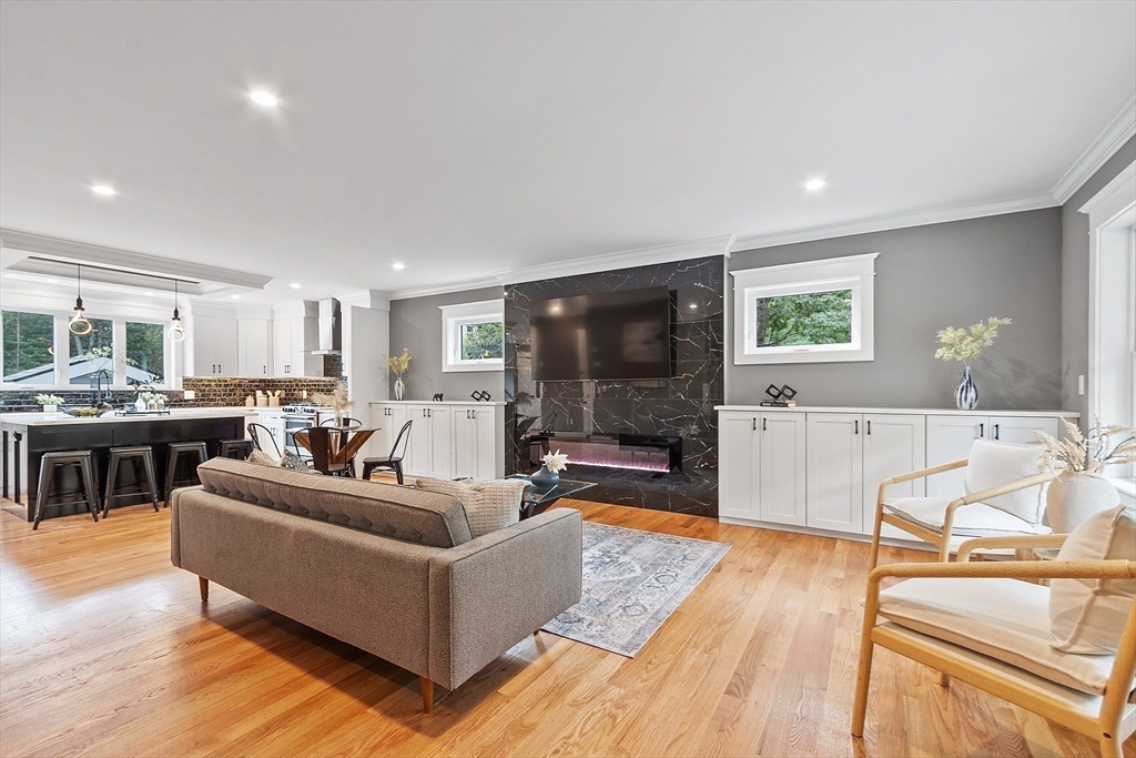 15-2 Park Street, Unit B North Reading, MA 01864 - Photo 5 of 39 a living room with furniture and a flat screen tv