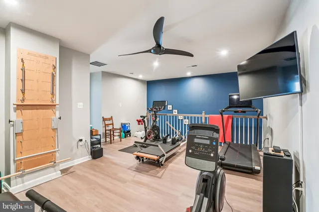 a bathroom with a tub and a sink
